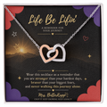 Mrs. ButerKupp's Interlock Heart Necklace.